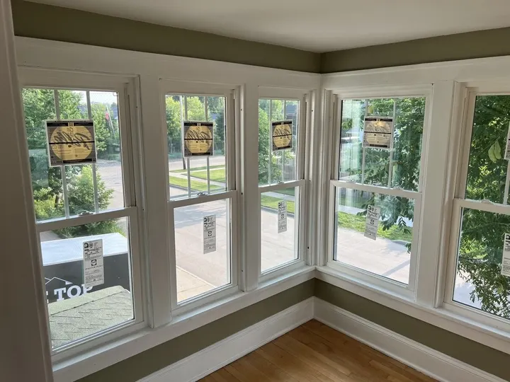 After: new white windows in the same corner