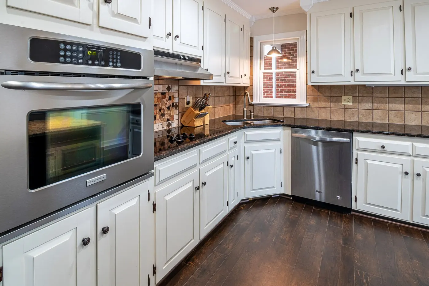 Renovated kitchen with white cabinets (representative photo)