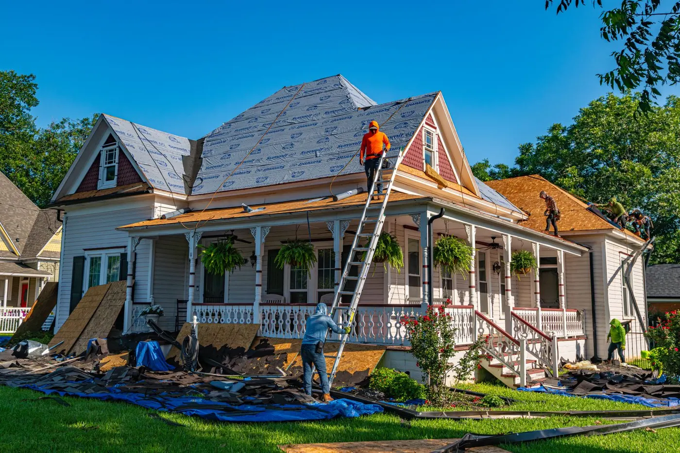 Crew tearing off an old roof on a Victorian house (representative photo)